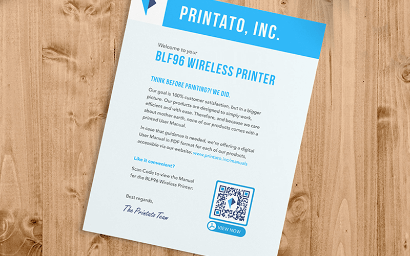 A QR Code on a wireless printer insert prompting people to scan to view the user manual