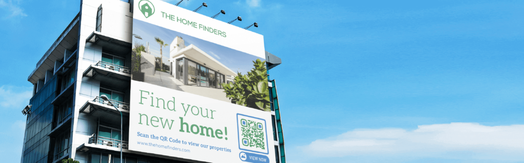 A large billboard on a building with a QR Code on it