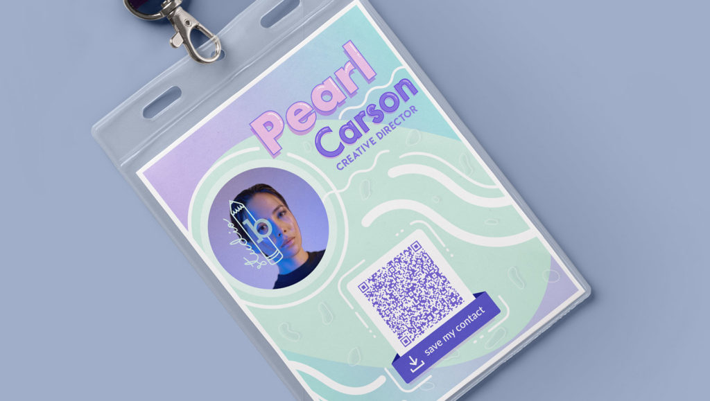 A QR Code on a professional conference badge, with a person's name, title, and contact CTA