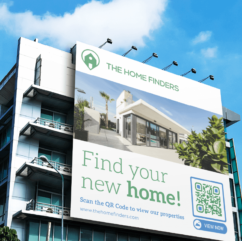 A large billboard on a building for a real estate agency with a QR Code on it