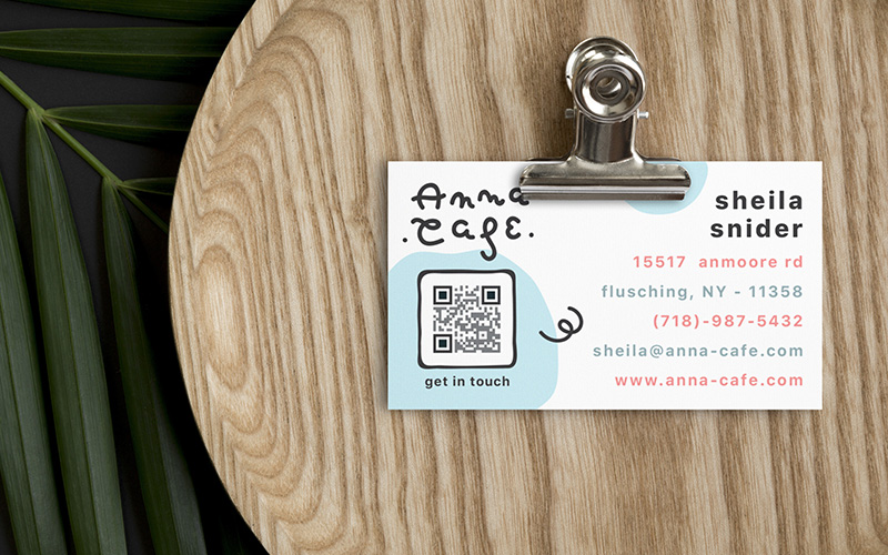 Business card with a QR Code that has a call to action reading "Get in touch.