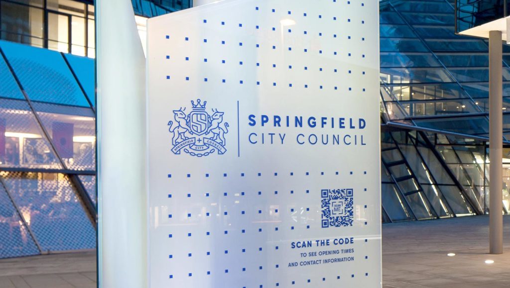 A city council's advertisement with a QR Code on it