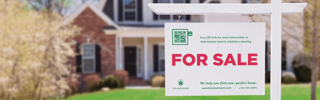 A For Sale sign outside of a home with a QR Code on it that people can scan for more information about the listing