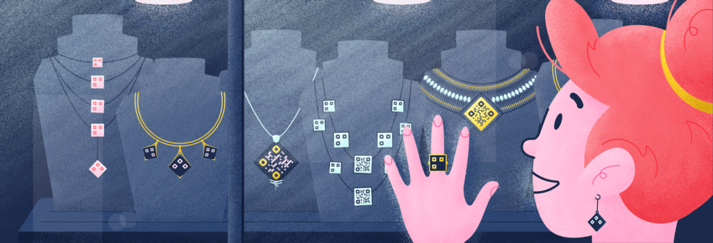 Woman looking at jewelry with QR Codes.