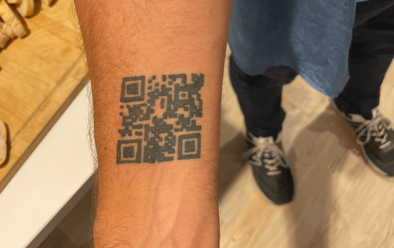 A QR Code tattoo on the inside of someone’s wrist.