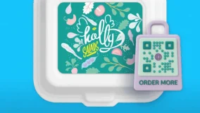 QR code on teal food packaging for "Salty Snacks" with an "Order More" call to action