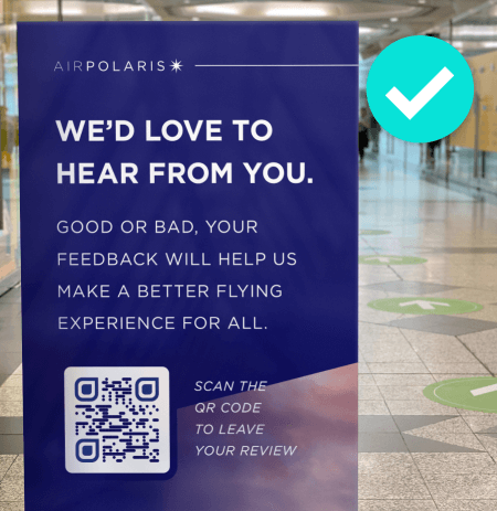 A poster from an airline asking passengers to leave a review by scanning a QR Code.