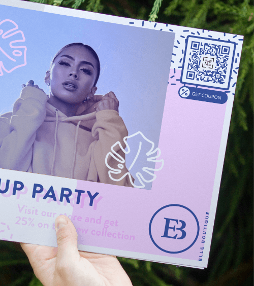 An advertisement in a store window with a QR Code that redirects users to view a PDF version of the latest fashion catalog.