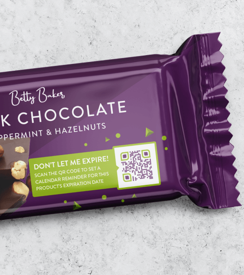 A purple package of a dark chocolate hazelnut bar with a QR Code printed on it to get an expiry date calendar reminder.
