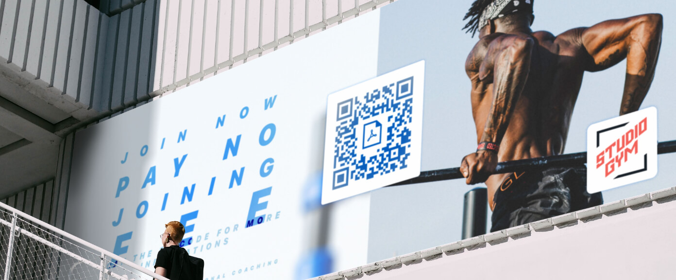 A fitness studio billboard with a QR Code that contains a PDF file of a full-service catalog.