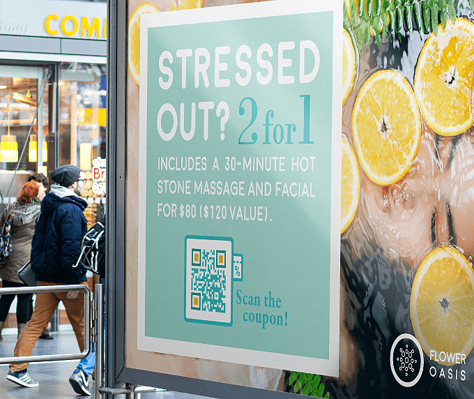 An outdoor poster of a spa and beauty studio with a QR Code that contains a coupon code to be redeemed.