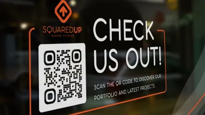 QR Code idea on a banner that promotes a design studio's social media