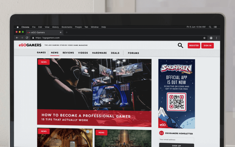 A laptop displaying eGO GAMERS’s news tab that displays a banner ad with a QR Code on it.