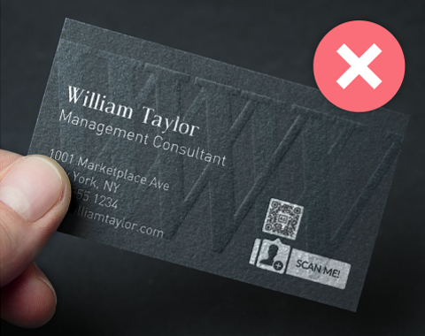 A black business card with a tiny unreadable silver QR Code and a red cross on the right.