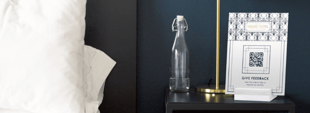 QR Code idea on a table tent in a hotel room