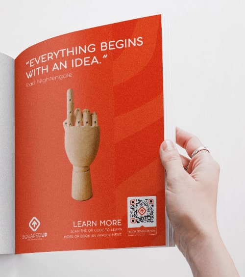 QR Code idea on a magazine ad that promotes a design studio's business