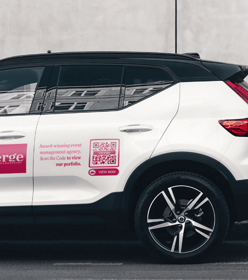 A vehicle of an event management company that advertises its business with a QR Code.