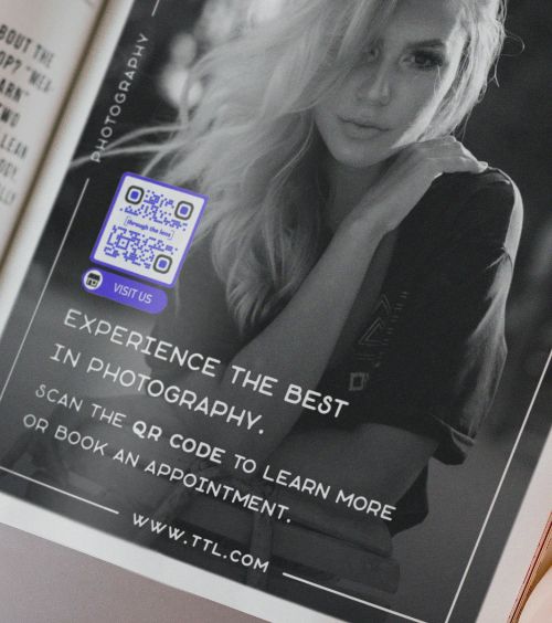 A magazine advertisement with a QR Code that leads to detailed business information of a photography studio.