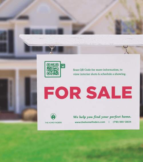 A white ‘For Sale’ signboard outside of a home with a QR Code that redirects users to an image gallery of the interior of the house.