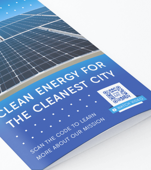 A promotional brochure from a city with a QR Code that redirects users to watch a video playlist about the city’s progress and developments.