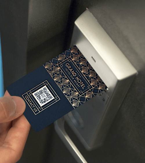 A hotel keycard with a QR Code that contains contact information for a hotel.