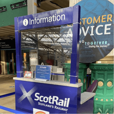 ScotRail information kiosk at a train station.