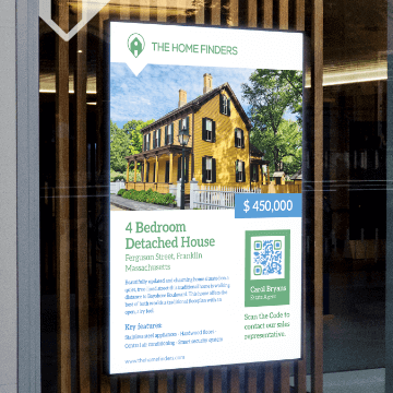 A QR Code with a well-designed frame on a digital sign.